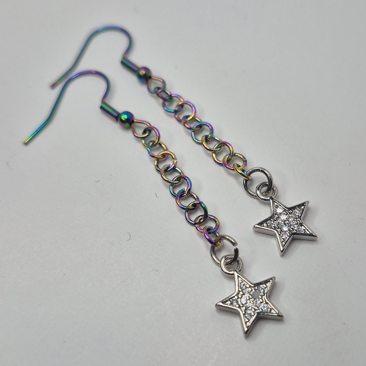Earrings, multichrome rainbow chainmaille with dangle star