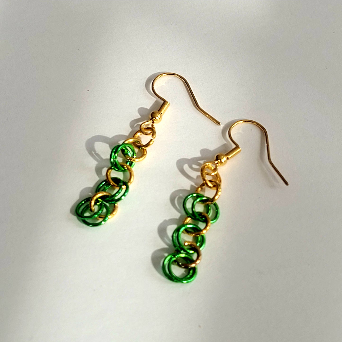 Earrings, green and gold chainmail