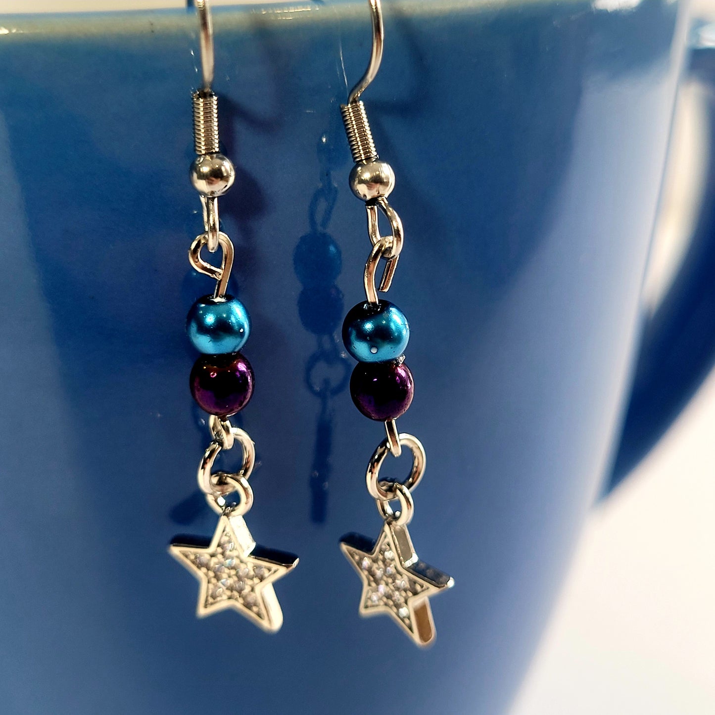 Earrings, blue and purple bead with dangle diamond star