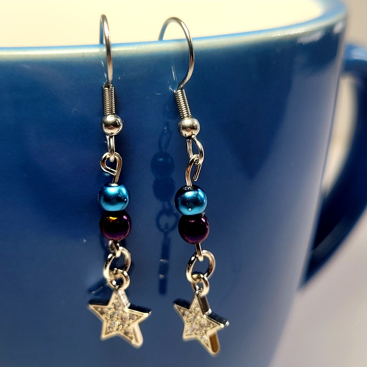 Earrings, blue and purple bead with dangle diamond star