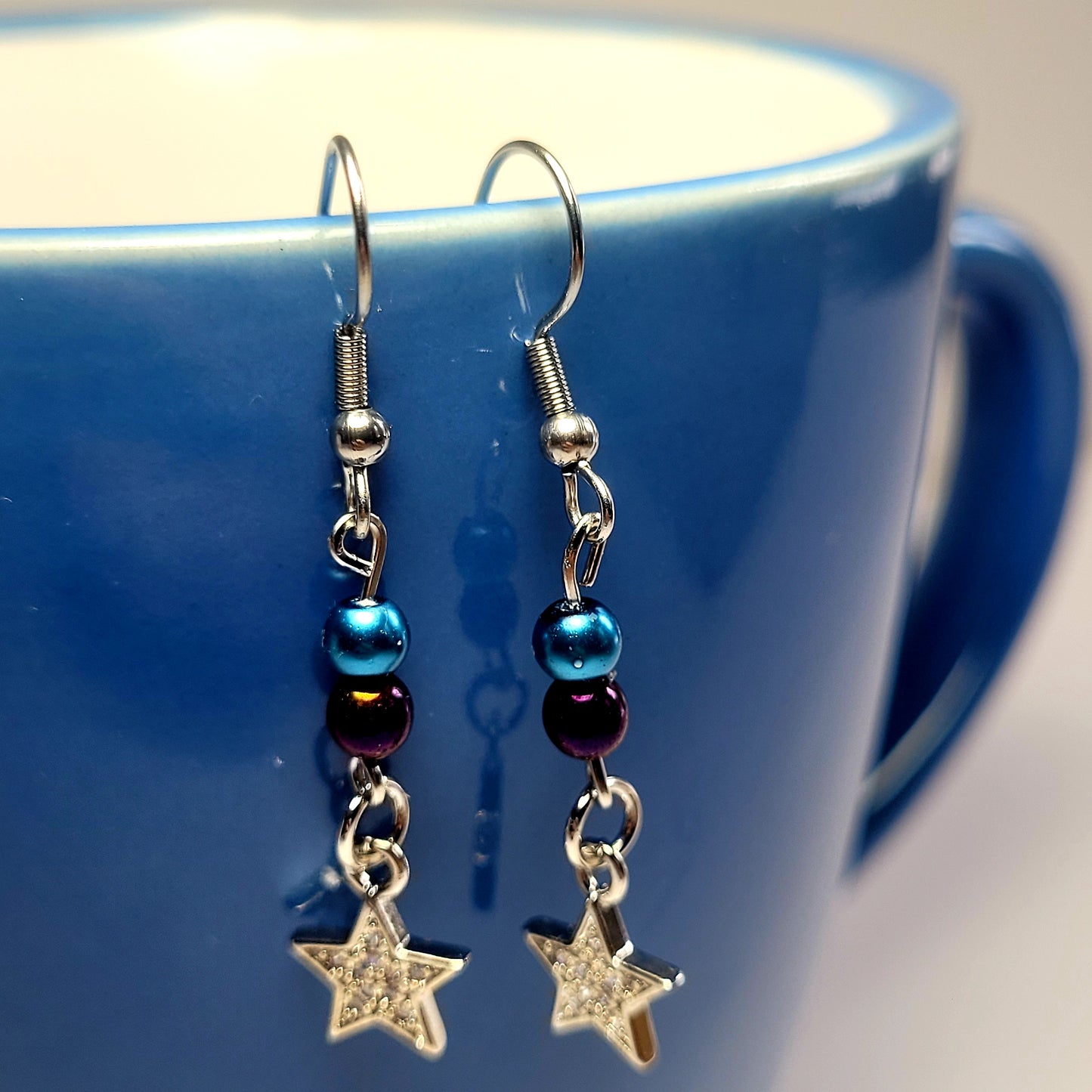 Earrings, blue and purple bead with dangle diamond star