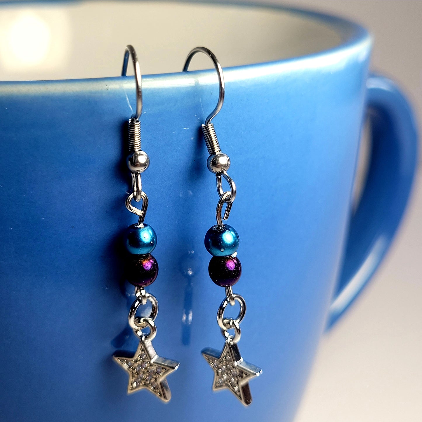 Earrings, blue and purple bead with dangle diamond star