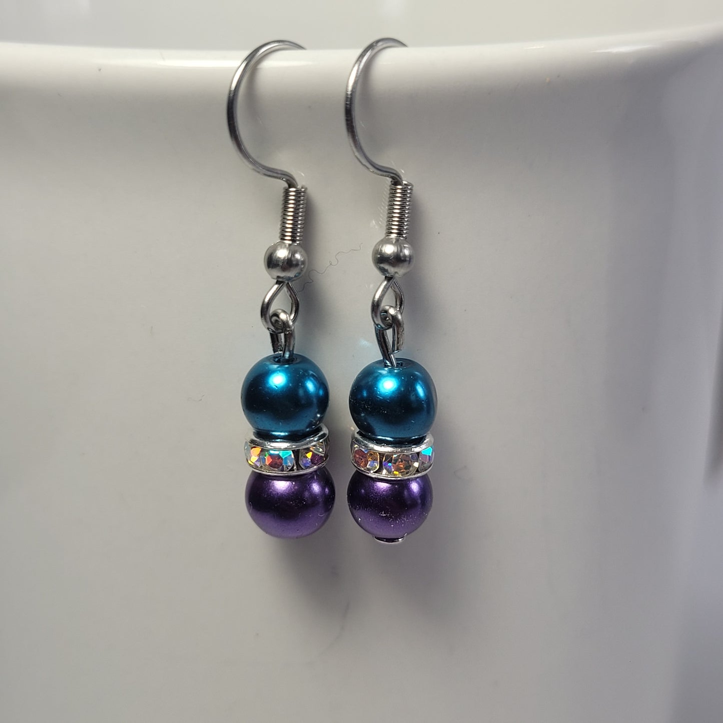 Earrings, blue and purple beads with diamonds