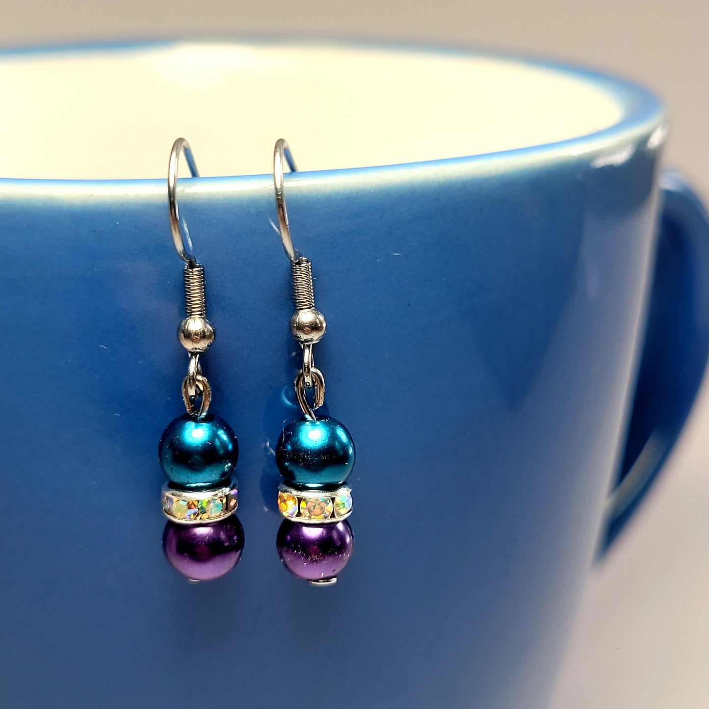 Earrings, blue and purple beads with diamonds