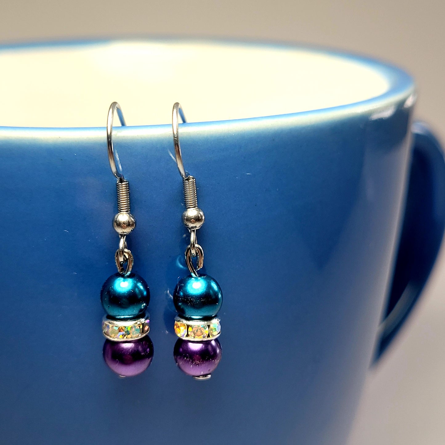 Earrings, blue and purple beads with diamonds