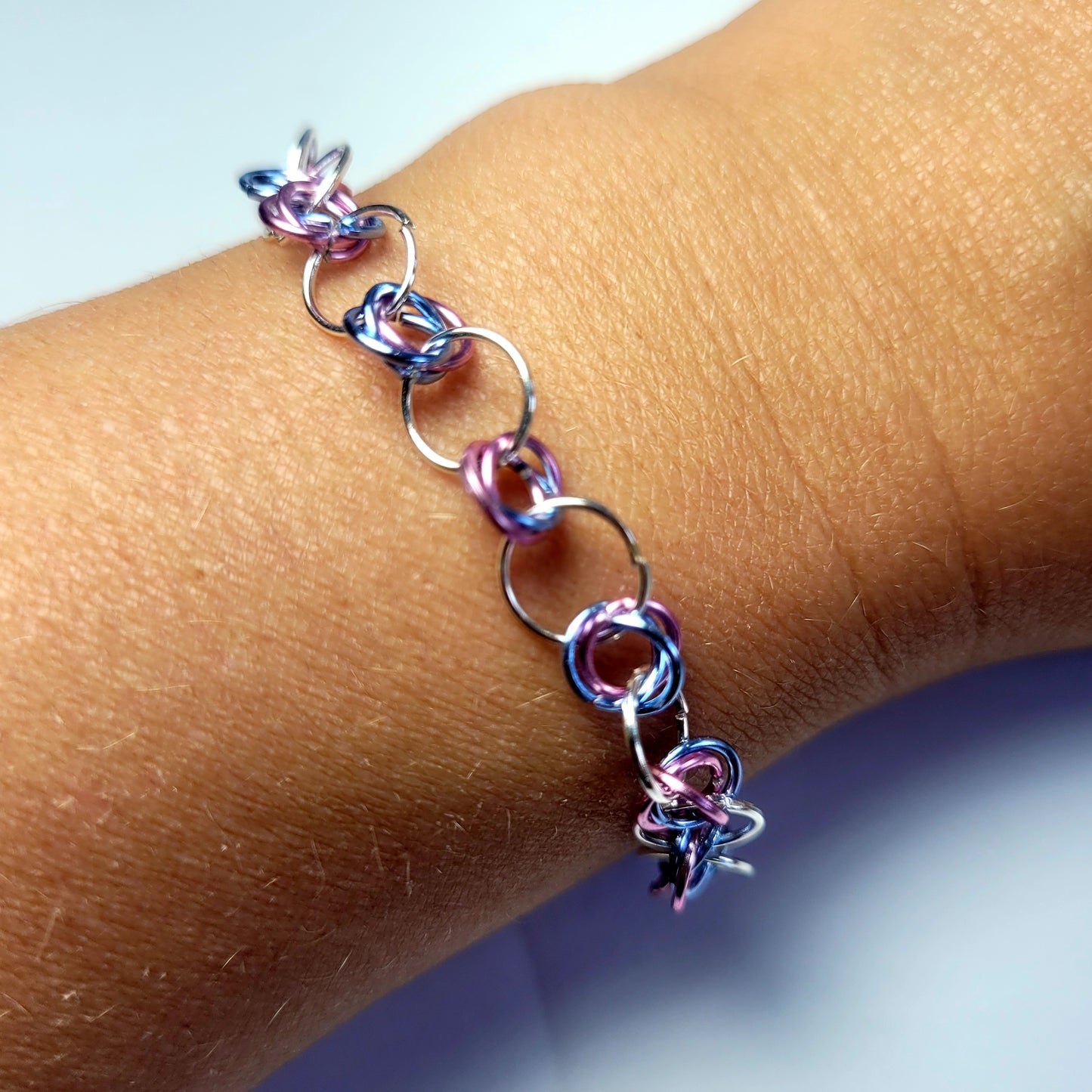 Bracelet and earring set, light pink, blue and silver chainmail