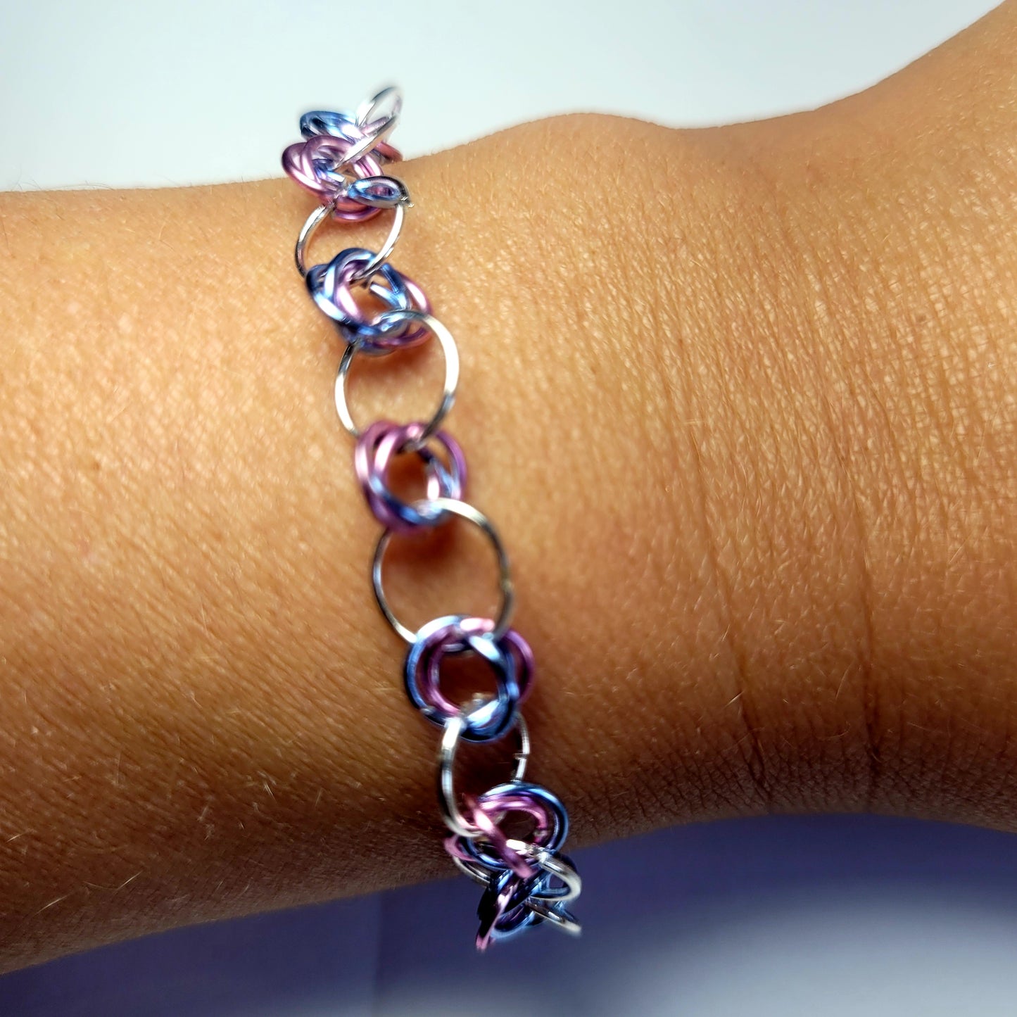 Bracelet and earring set, light pink, blue and silver chainmail