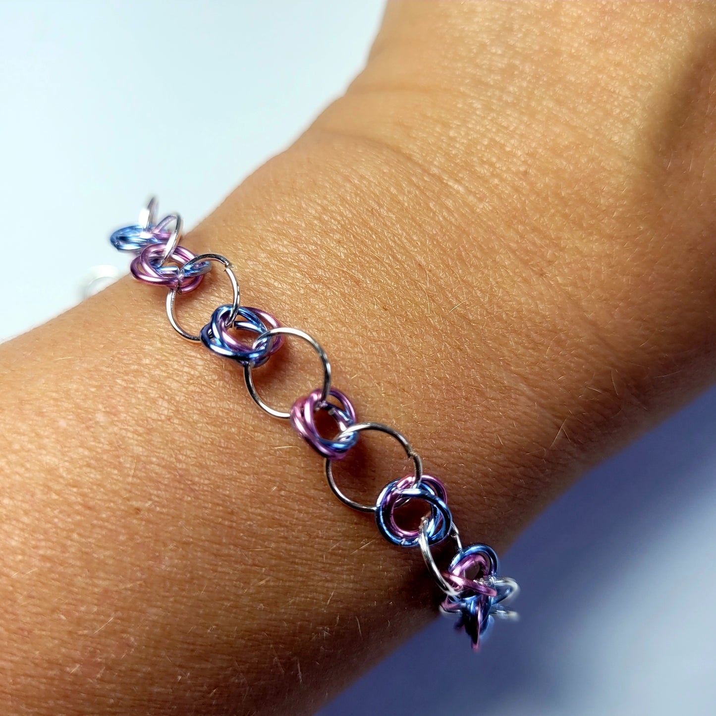 Bracelet and earring set, light pink, blue and silver chainmail