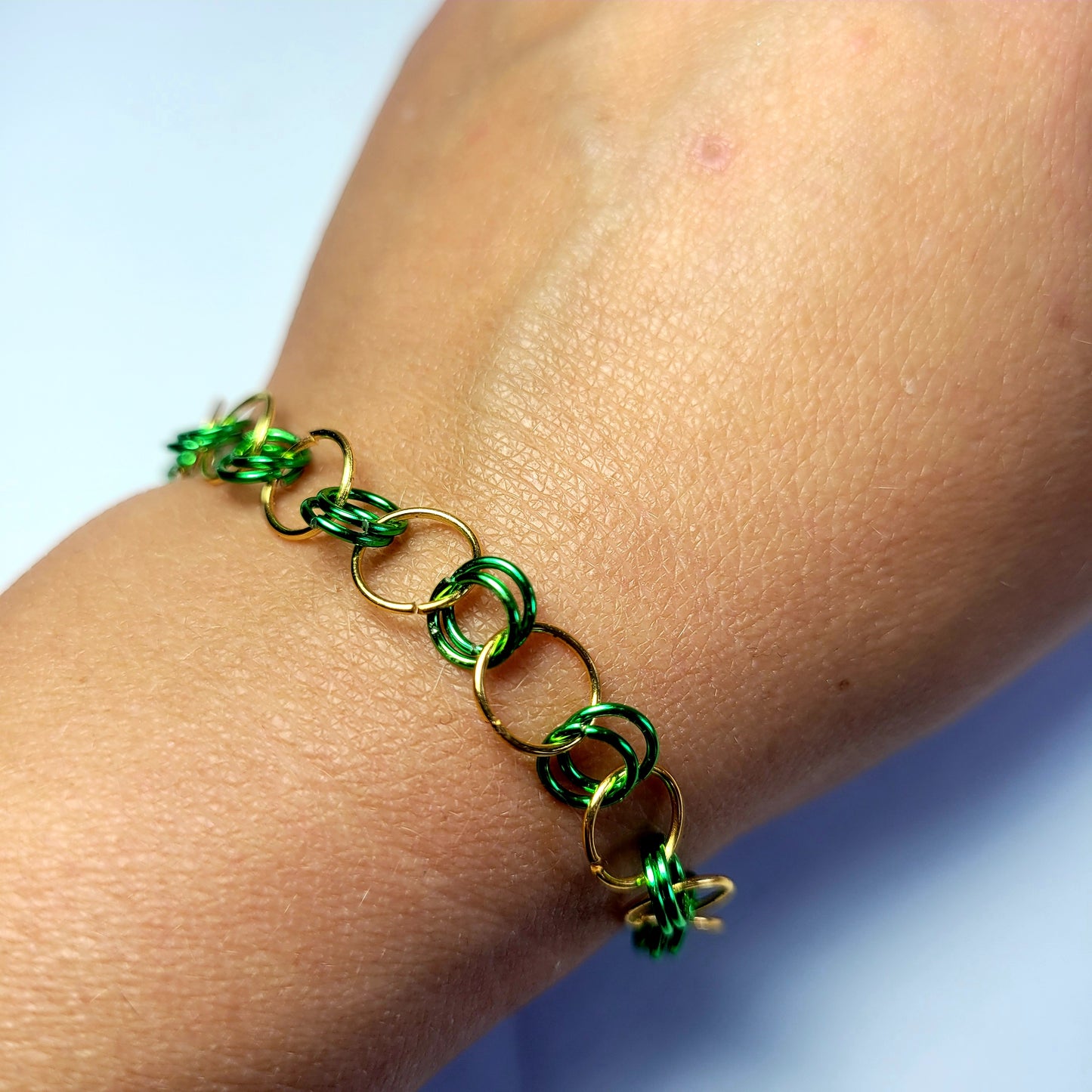 Bracelet and earring set, green and gold chainmail