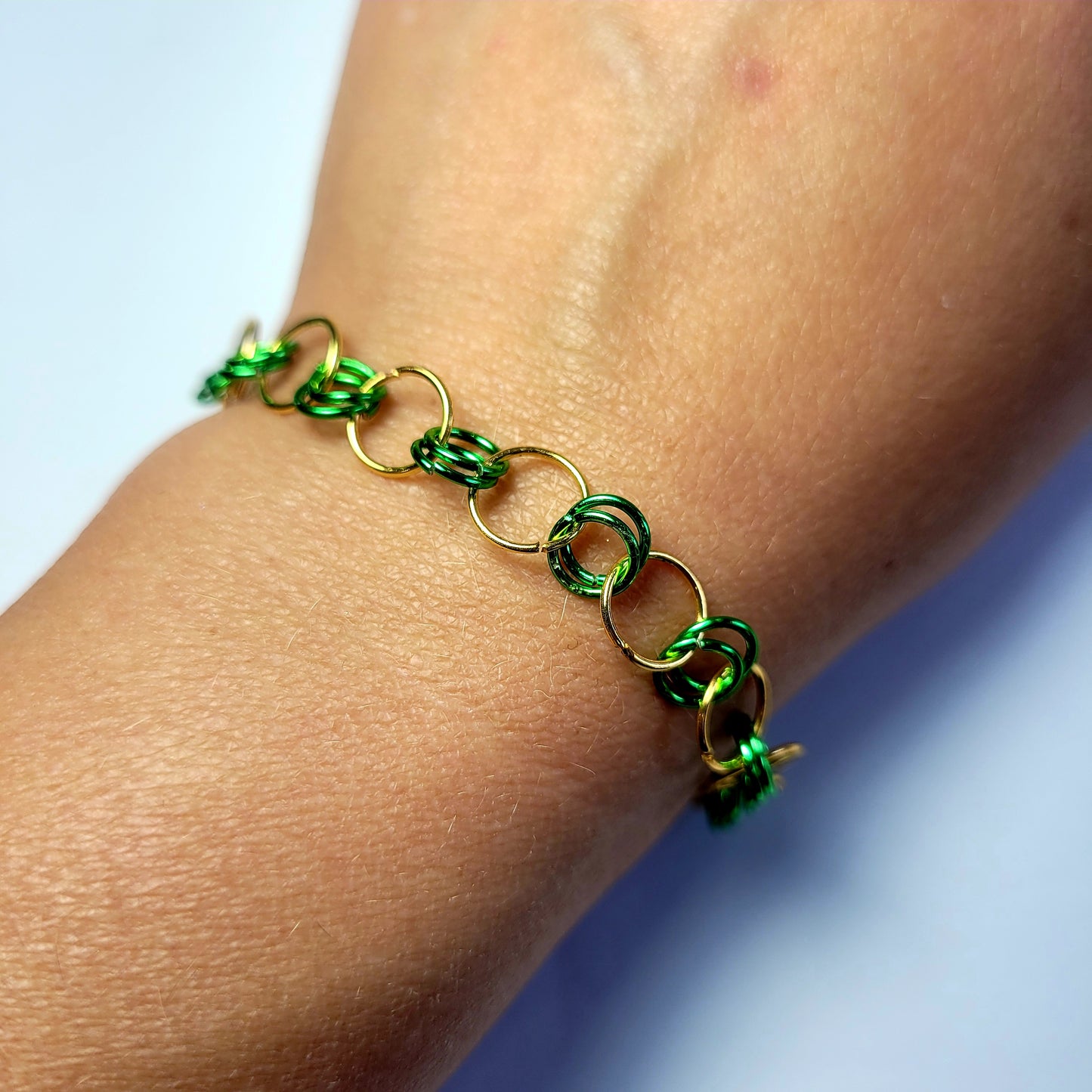 Bracelet and earring set, green and gold chainmail