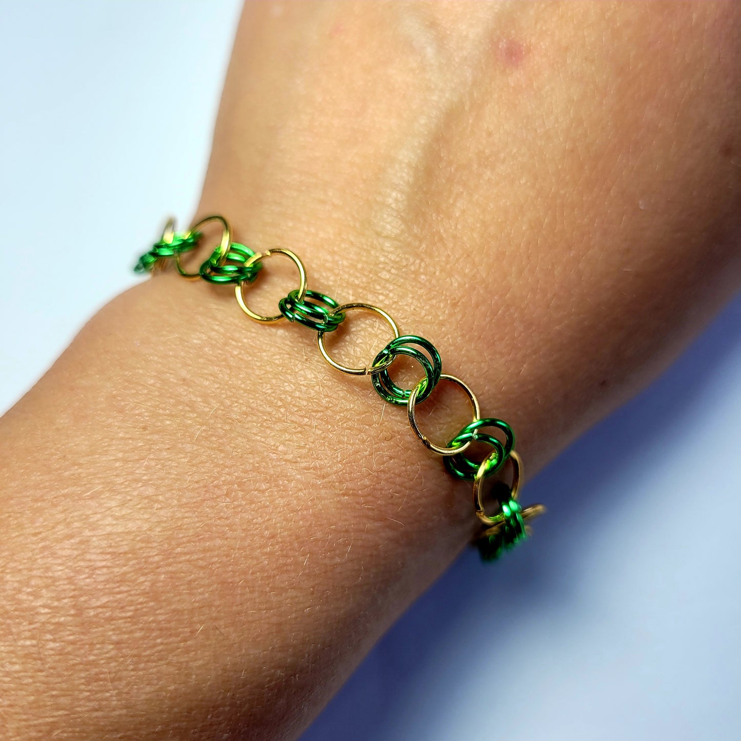 Bracelet, green and gold chainmail