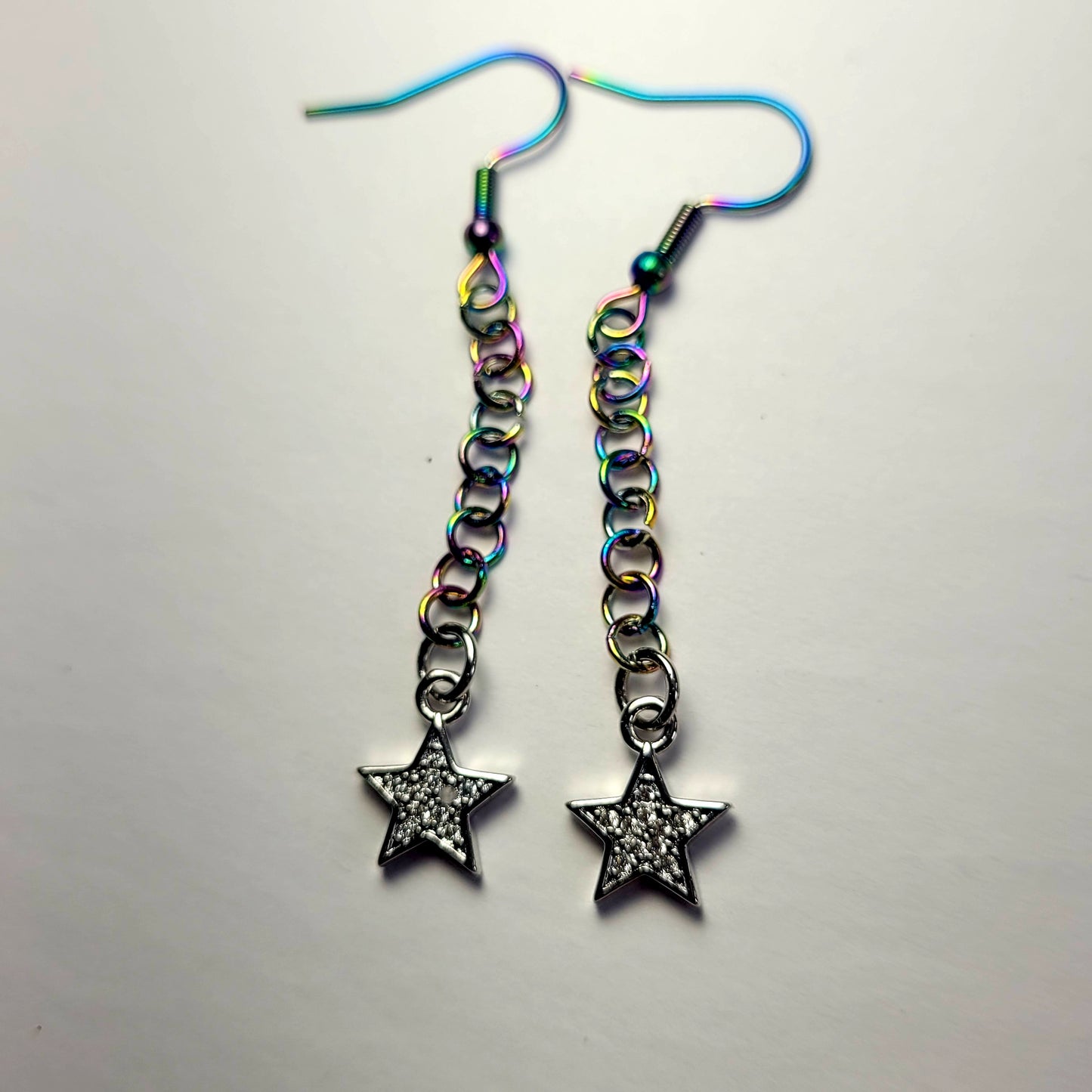 Earrings, multichrome rainbow chainmaille with dangle star