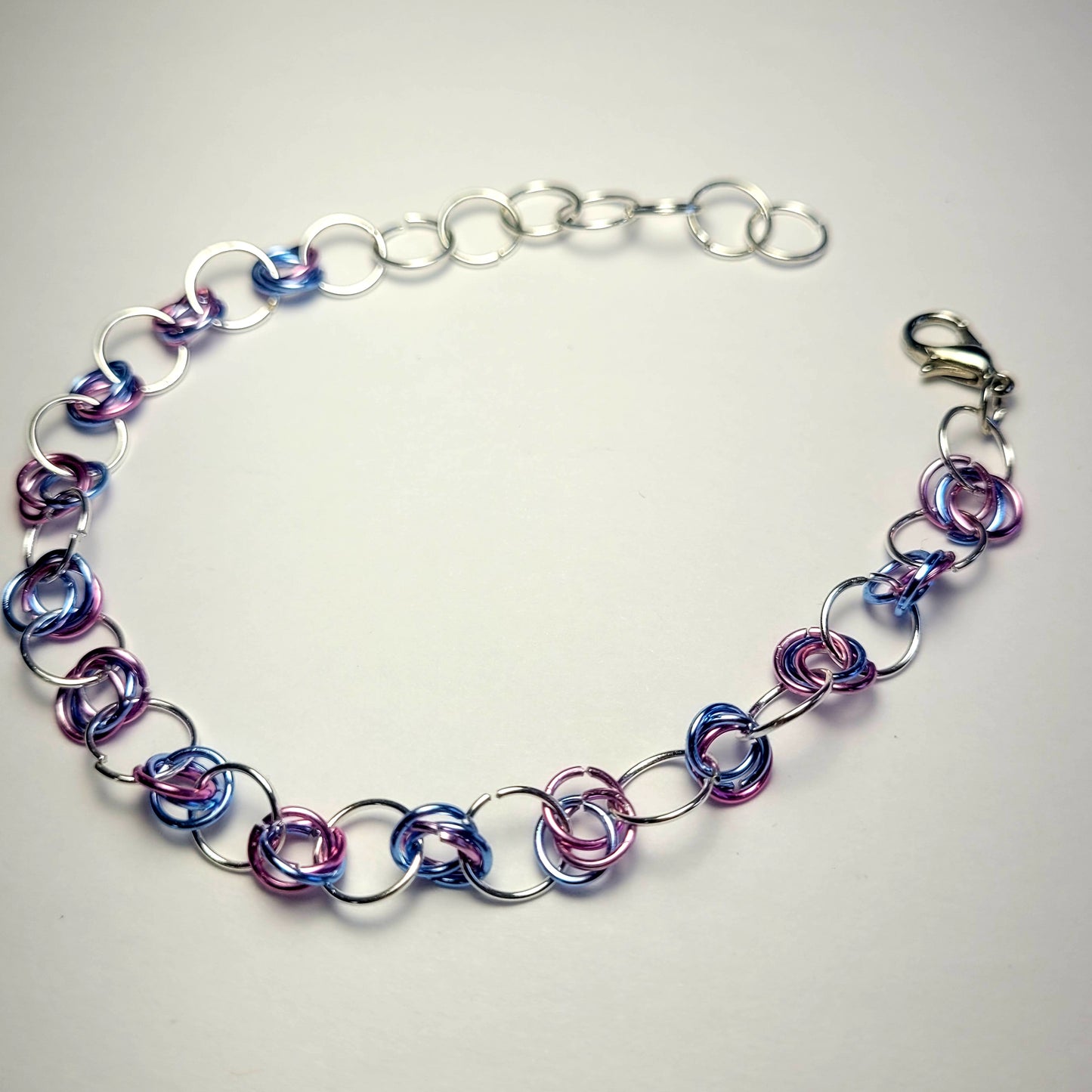 Bracelet and earring set, light pink, blue and silver chainmail