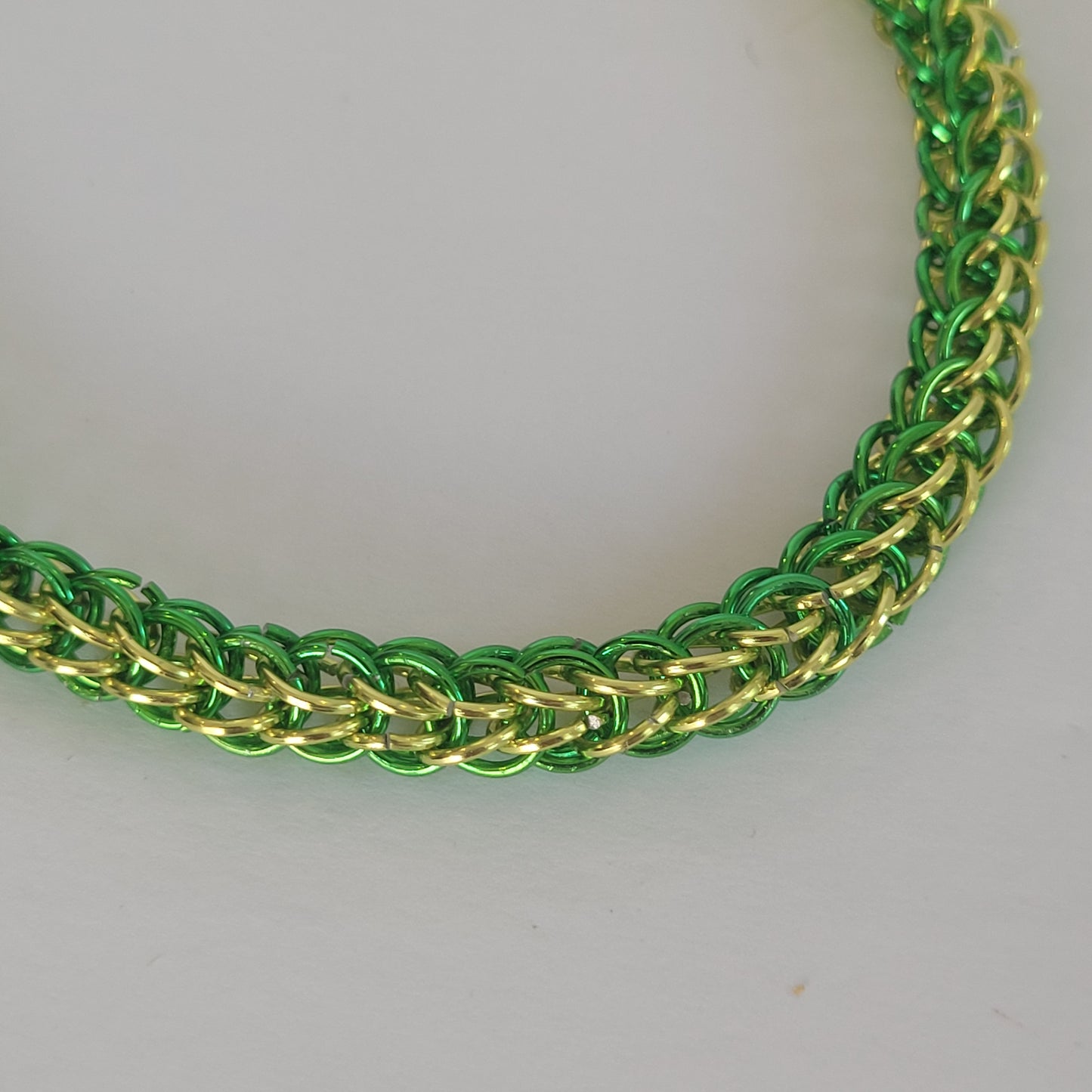 Bracelet, green and yellow chainmail